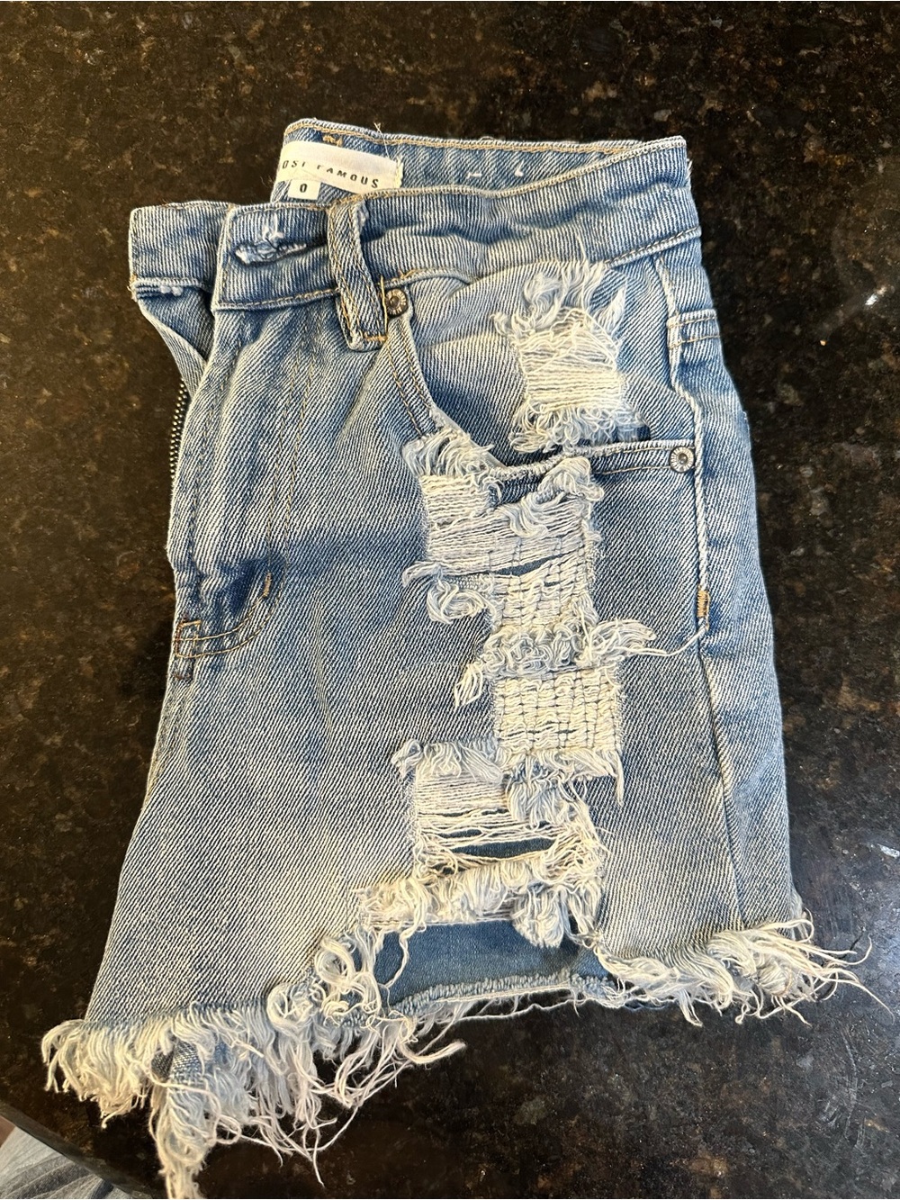 Almost Famous Light Blue Denim Skirt with Branded Button